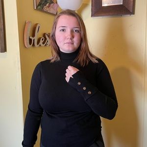 Women’s black turtleneck